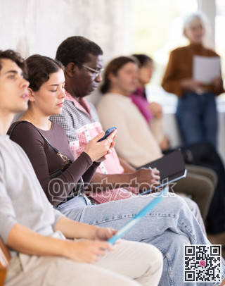 People are sitting in line and waiting for an interview