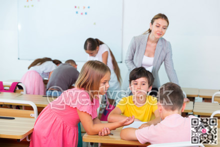 Schoolchildren performing team tasks