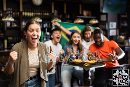 Young woman supporting football team in bar