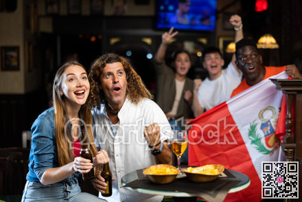 Peru football team fans spending time in bar