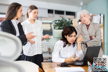Group of women are shouting at female colleague.