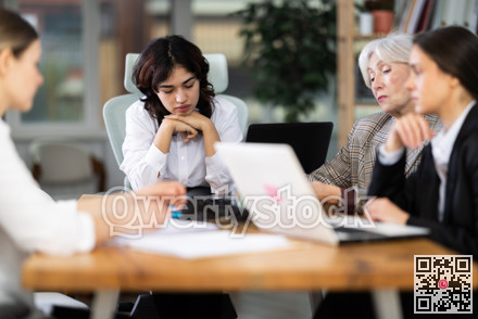 Tired female colleagues feeling tired during a long workday