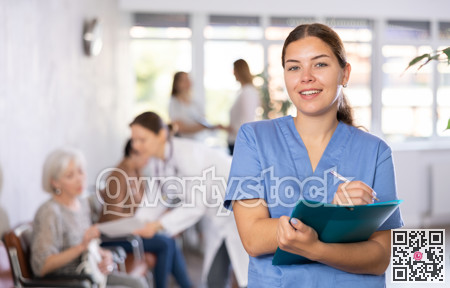 Woman doctor wear white medical uniform and stethoscope with folder of documents
