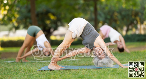 Young woman doing yoga in park