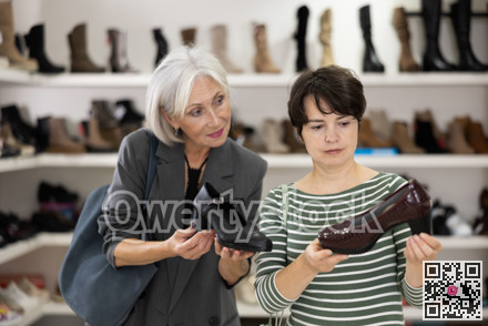 Adult and elderly women choose classic shoes