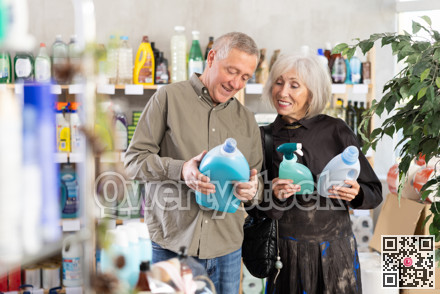 Elderly couple opting for cleaning spray and detergent