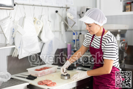 Cooking semi finished products - girl prepares meat cutlets using special devices