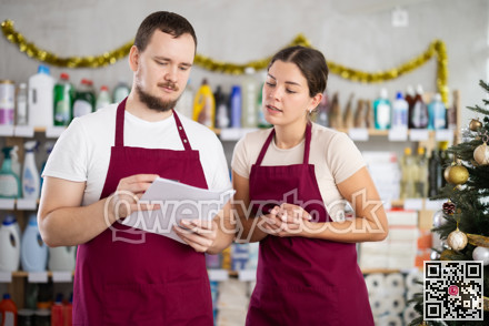 Retail workers discussing inventory results in personal care products store