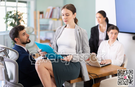 female employee of the company flirts with a male employee