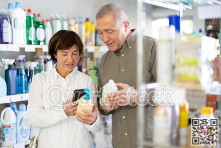 Couple man and woman scanning qr code for liquid soap