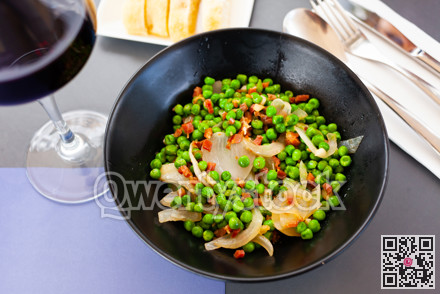 Appetizing dish of peas with ham