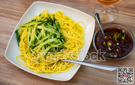 Noodles with cucumbers and meat sauce