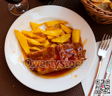 American style fried ribs with potatoes