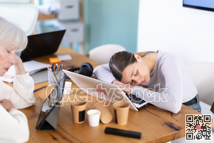 Tired elderly and adult female colleagues fall asleep while working