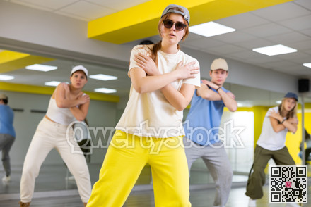 Boys and girls learn to dance dances in dance studio