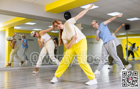 Young girl training breakdance Toprock moves in dance hall