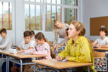 Portrait of schoolgirl at lesson in school
