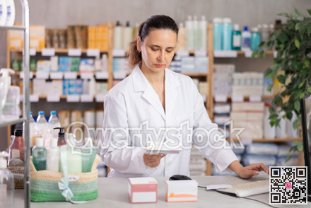 Woman pharmacist offers medication drug remedy