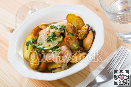 Stewed potatoes with shrimps, mussels