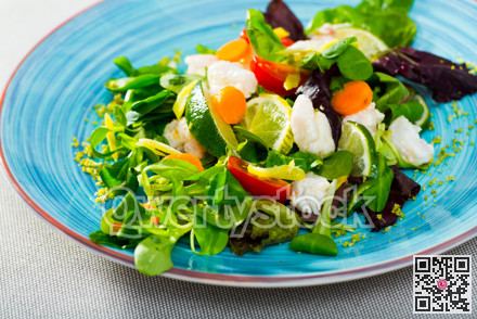 Salad with pickled merluccius