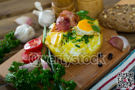 Tasty potato stuffed with eggs, bacon, cheese