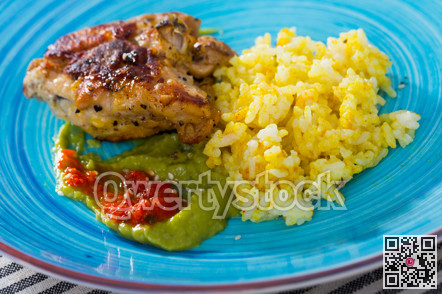 Baked chicken thighs and spicy rice with sauces