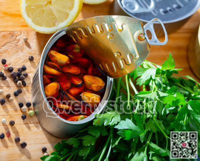 Pickled mussels in oil with parsley, lemon, spices