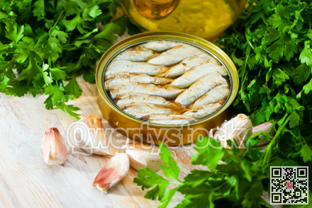 Tin can with smoked sprats, sardines