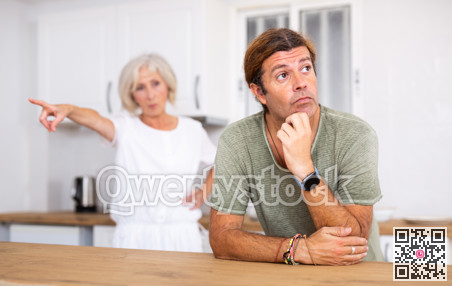 Mature couple quarreling at home, relationship problems
