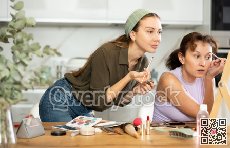 Woman doing eyebrow makeup with brush