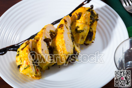 Turkey breast with prunes on plate