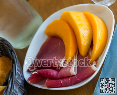Thin slices of jamon served with melon