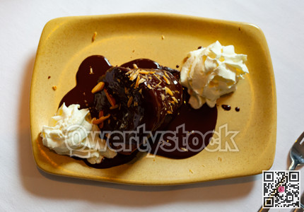 Chocolate cake with melted chocolate