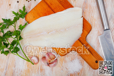 Fresh halibut fillet with seasonings