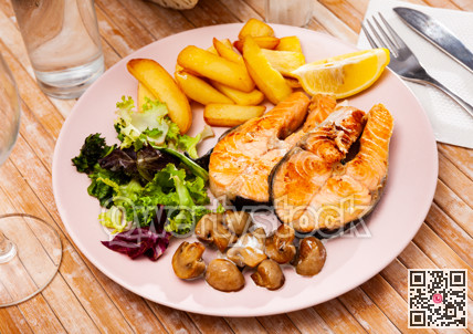 Fried salmon with fried potatoes and mushrooms, nobody
