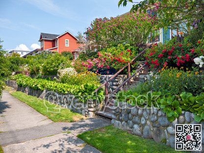 A perfect neighborhood. Area of residential houses with land terraces decorated with flowers