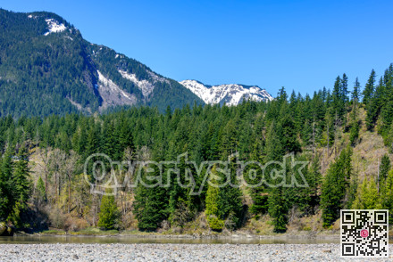 View at snowy mountains in British Columbia. Stoney mountain riverbed
